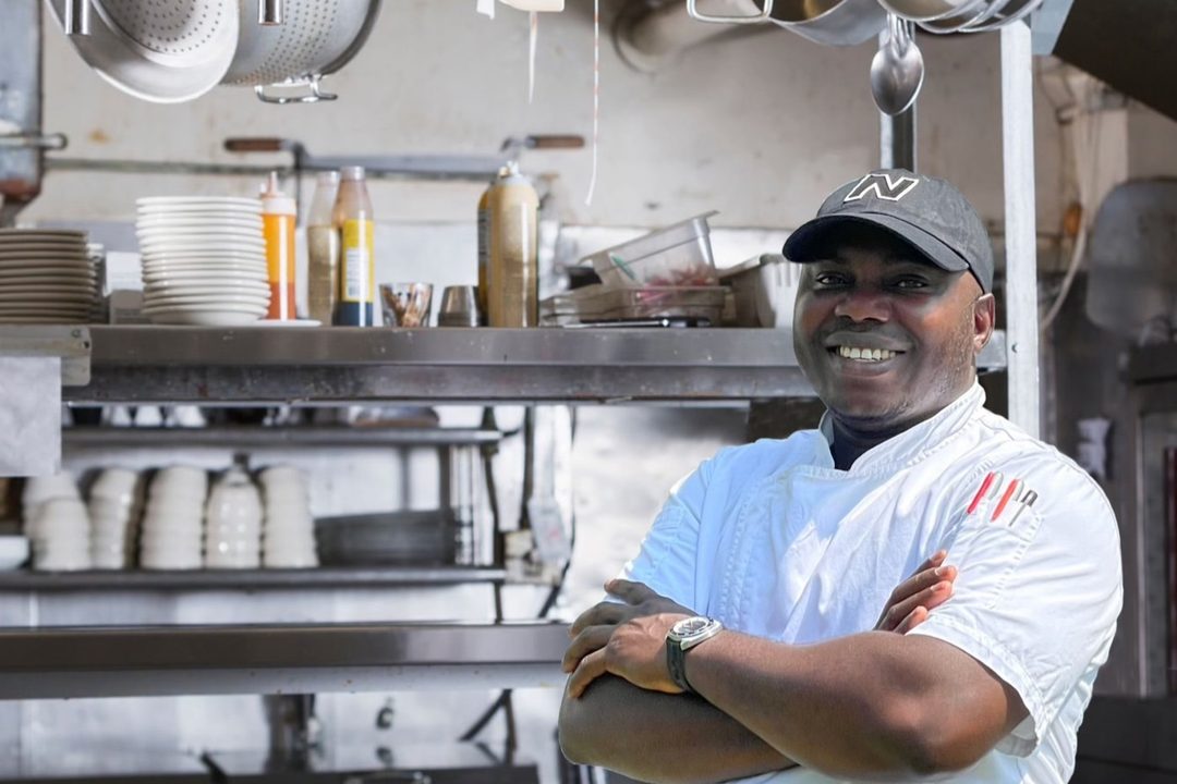 Nathaniel Davis in a working kitchen