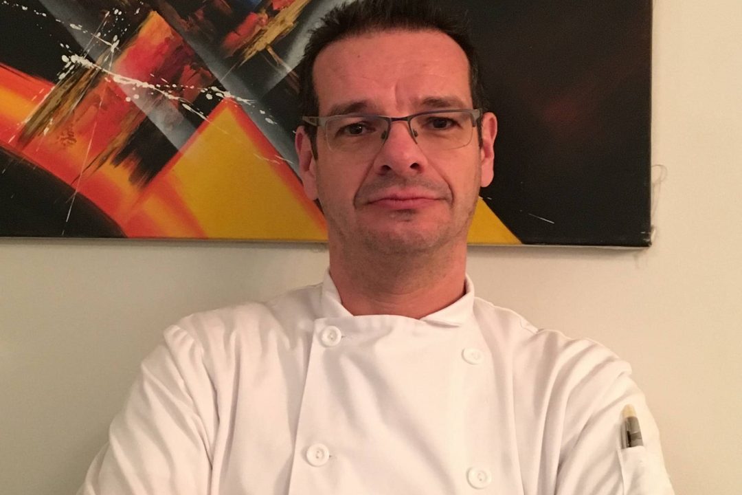 Nicolas Desinai in a working kitchen